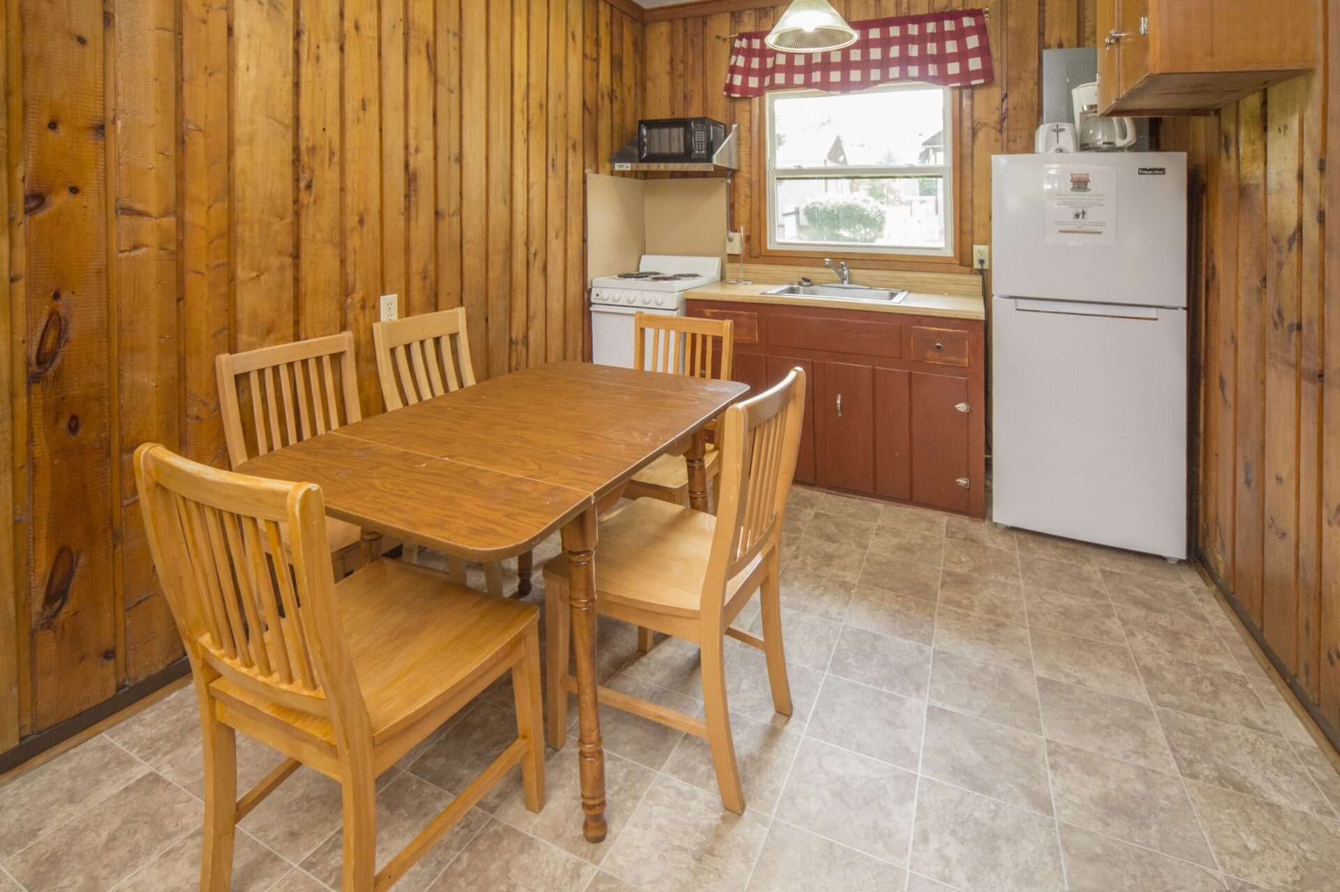 kitchenette with dining table and chairs