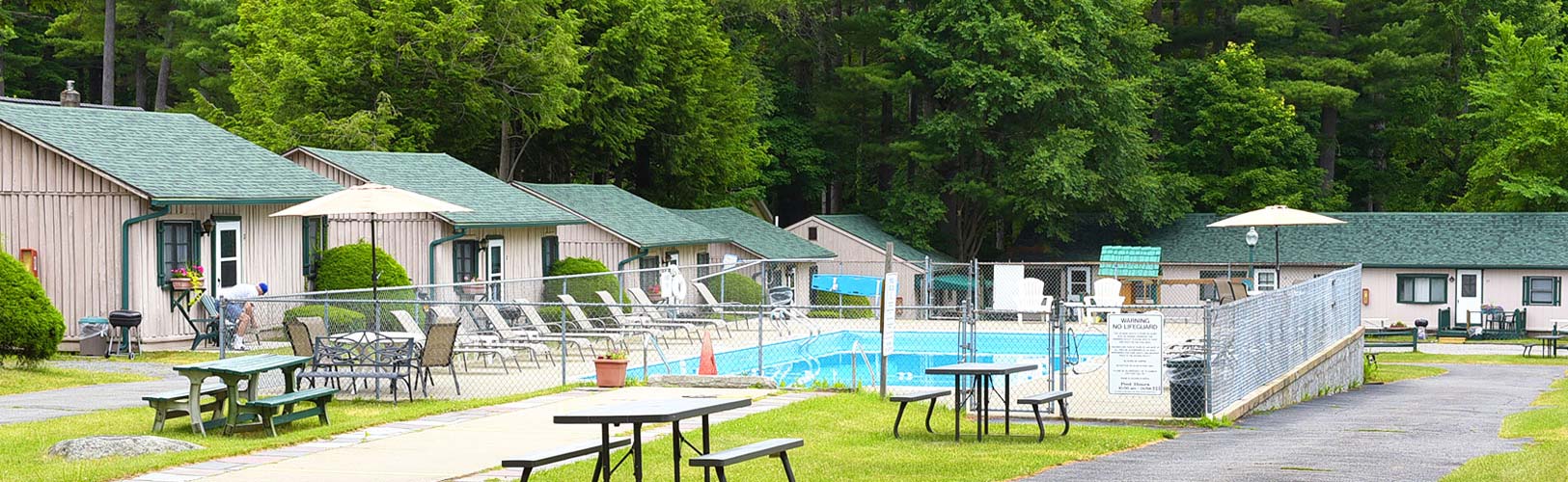 Cabins 1-15 and apartment suites situated around the main pool, playground and shuffleboard areas