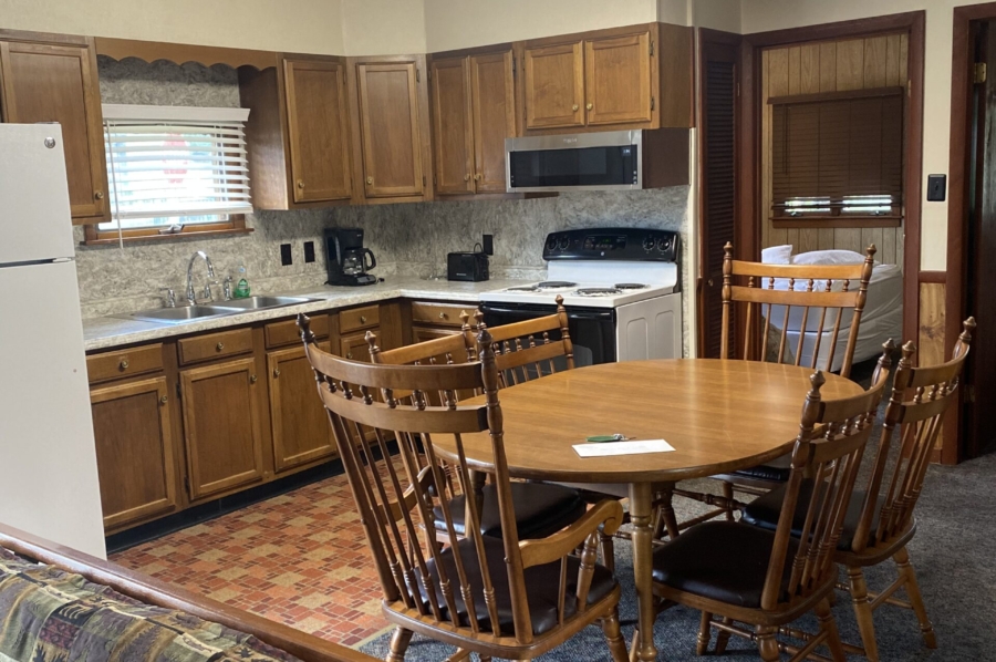 Kitchen with dining table and chairs