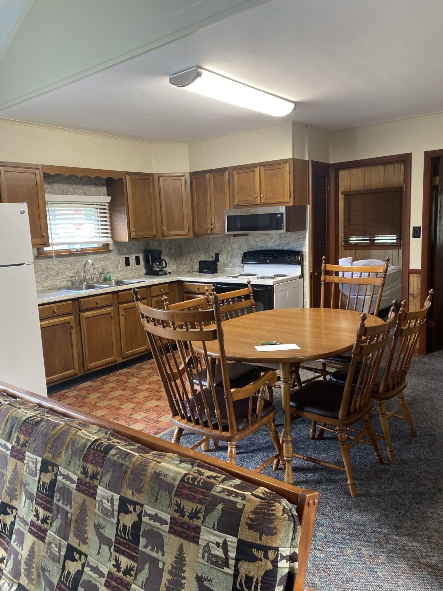 Kitchen with dining table and chairs